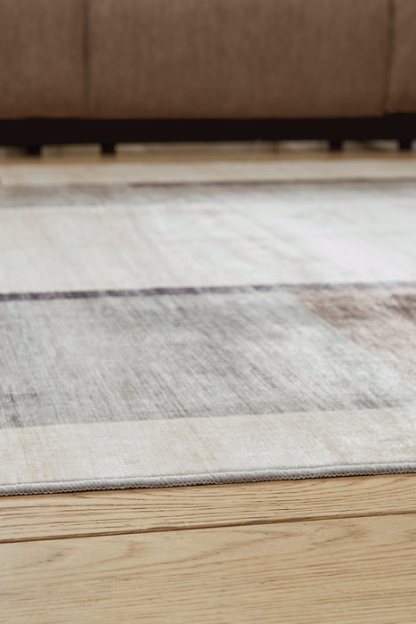 Larkport Washable Area Rug - Visions in Furniture (La Mirada, CA)