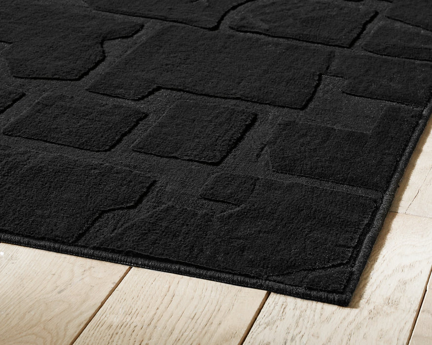 Gibbswell Washable Area Rug - Visions in Furniture (La Mirada, CA)