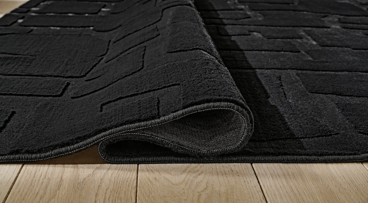 Gibbswell Washable Area Rug - Visions in Furniture (La Mirada, CA)