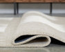 Wolbert 7'8" x 10' Area Rug - Visions in Furniture (La Mirada, CA)